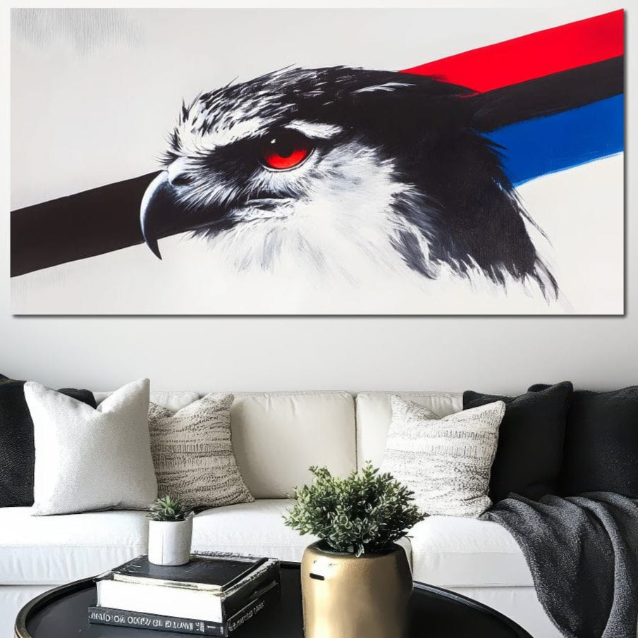 tablou canvas cu un cap de vultur cu ochi rosu, pe fundal alb cu linii diagonale in rosu, negru si albastru