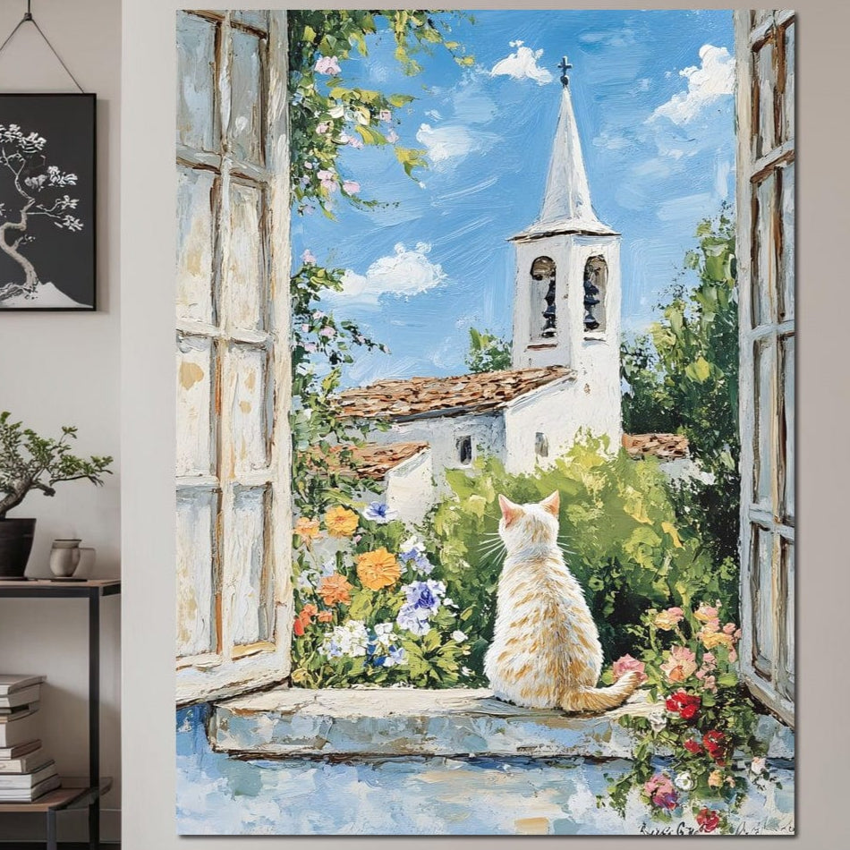 tablou canvas cu o pisica alba la fereastra, privind un turn bisericesc cu clopot, inconjurat de flori si vegetatie intr-un peisaj pictat de primavara