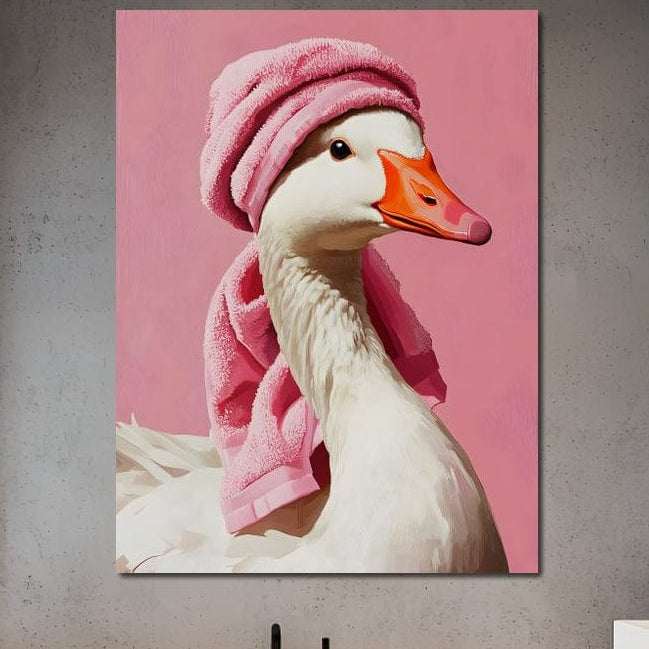 tablou canvas cu o gasca alba, cu un prosop roz, pe fundal roz pastelat