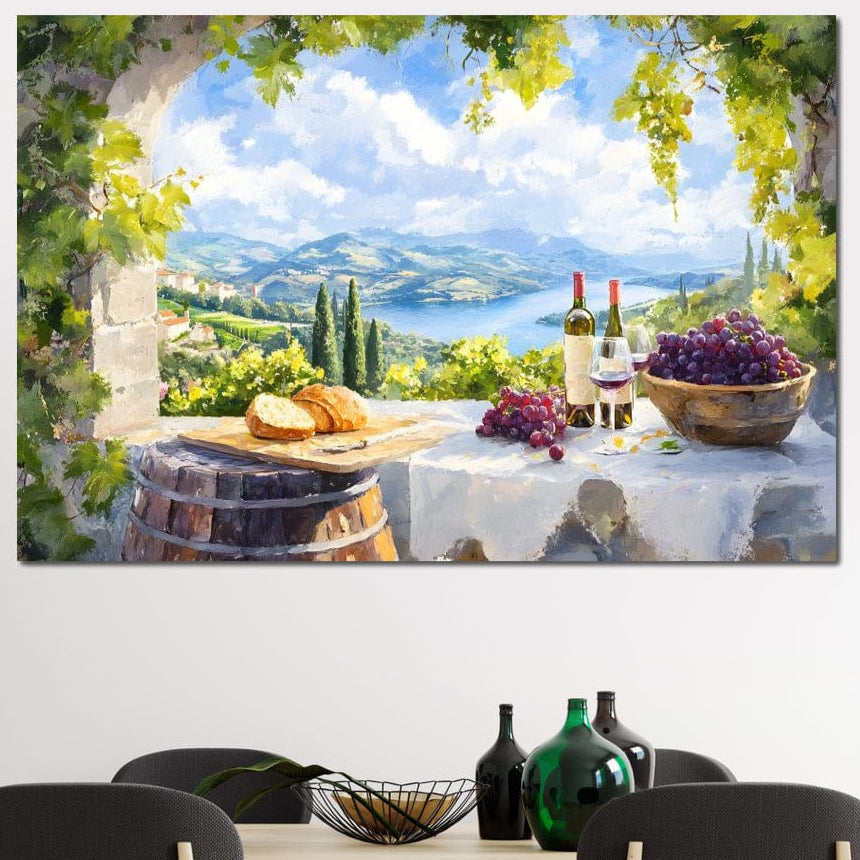 tablou canvas cu un peisaj rustic, cu paine, struguri rosii si sticle de vin rosu, pe fundal cu dealuri si cer senin