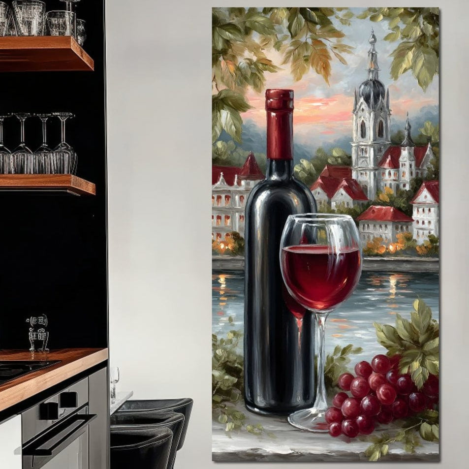 tablou canvas cu o sticla si un pahar de vin rosu, struguri rosii pe malul unui lac, intr-un peisaj urban cu o manastire
