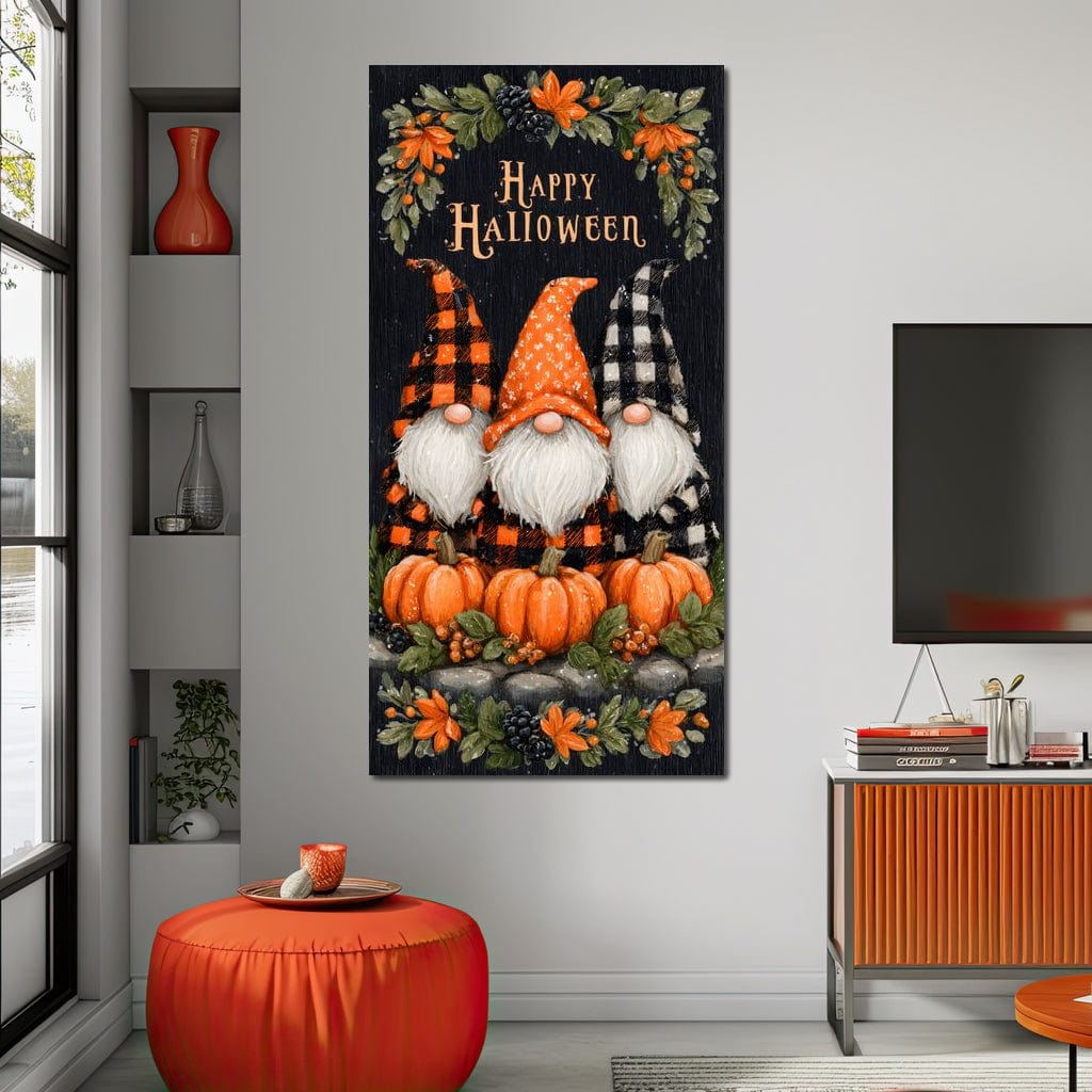 tablou canvas cu trei pitici cu trei dovleci in tema sarbatorii de Halloween, pe fundal intunecat