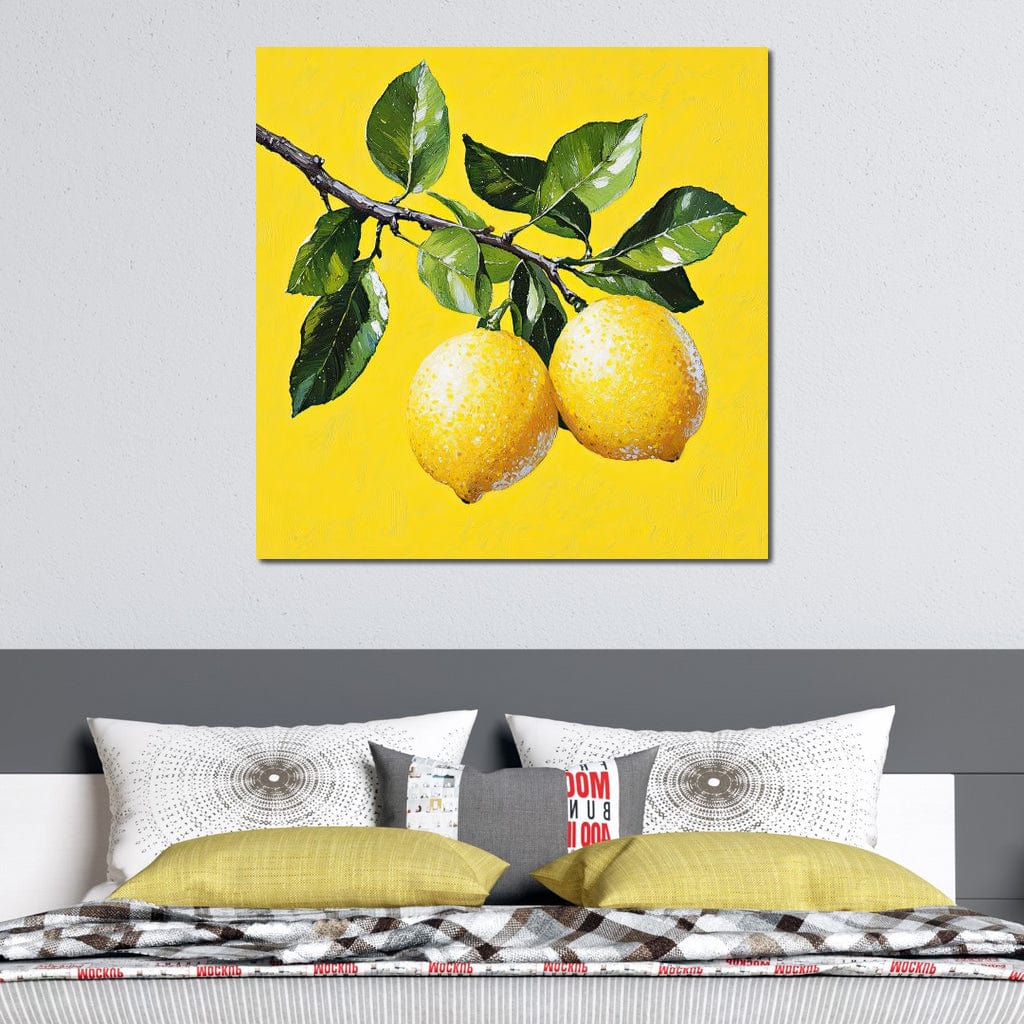 tablou canvas cu doua lamai pe o crenguta cu frunze verzi, pe fundal galben intens