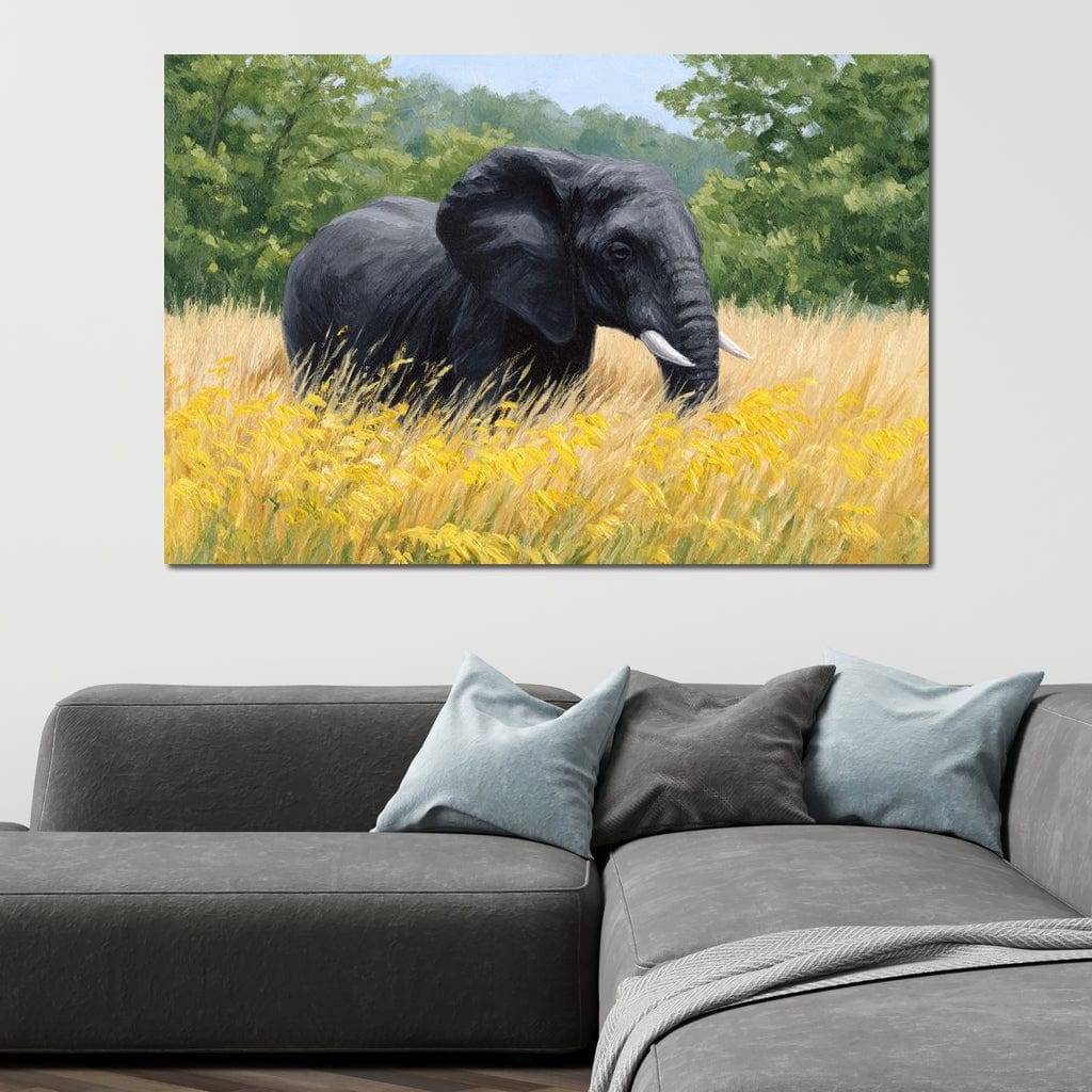 tablou canvas cu un elefant intr-un lan auriu, pe fundal natural cu vegetatie, redat in stil pictura