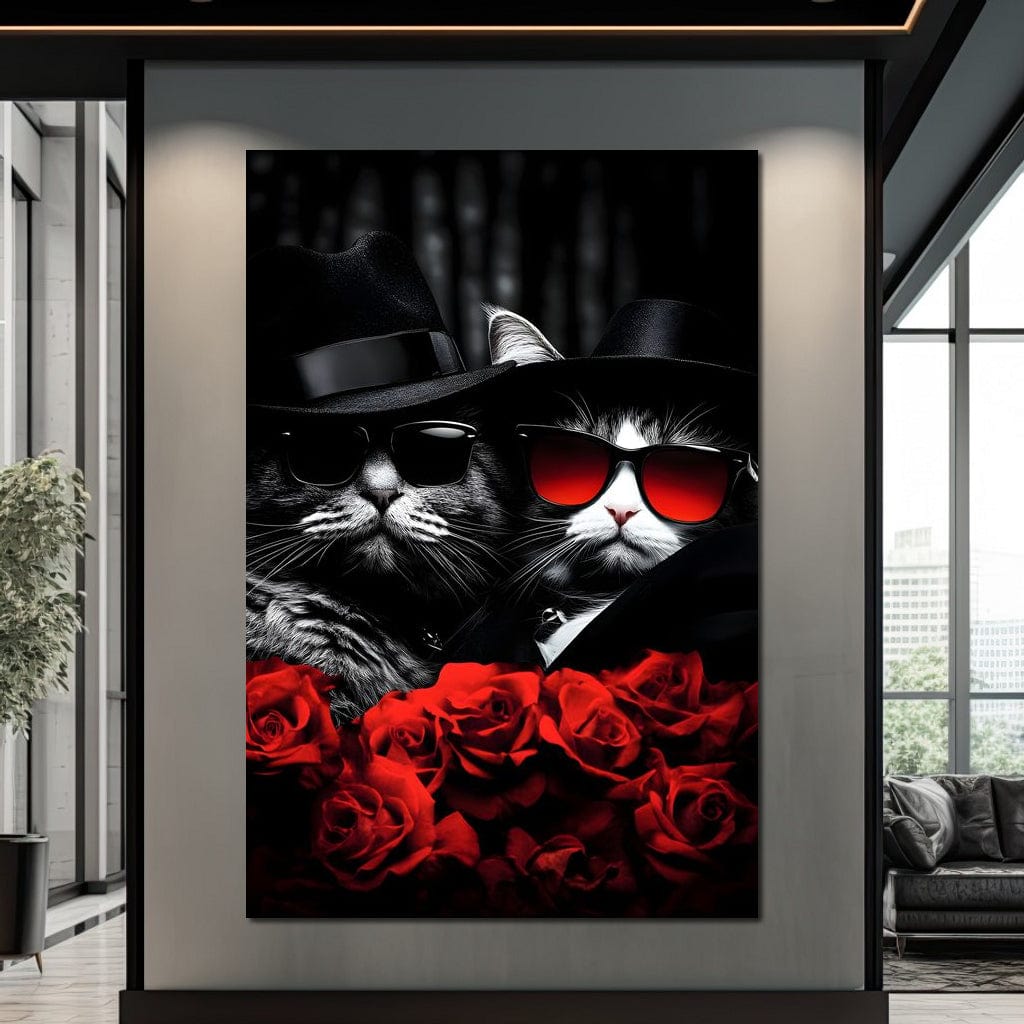 tablou canvas cu doua pisici costumate in negru, cu ochelari de soare, inconjurate de trandafiri rosii, pe fundal in stil cinematografic