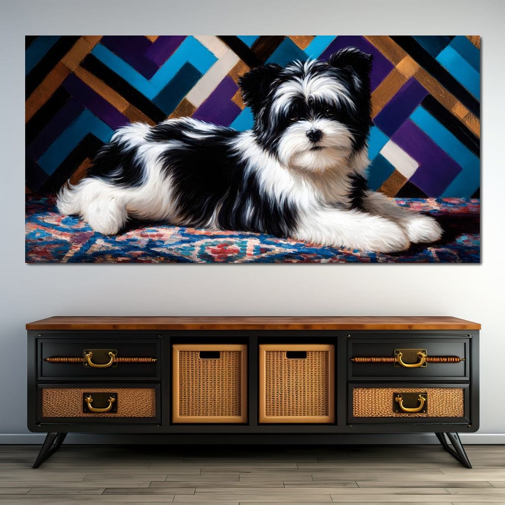 tablou canvas cu un catel blanos, alb si negru, asezat pe un covor colorat, pe fundal geometric in tonuri de albastru, violet