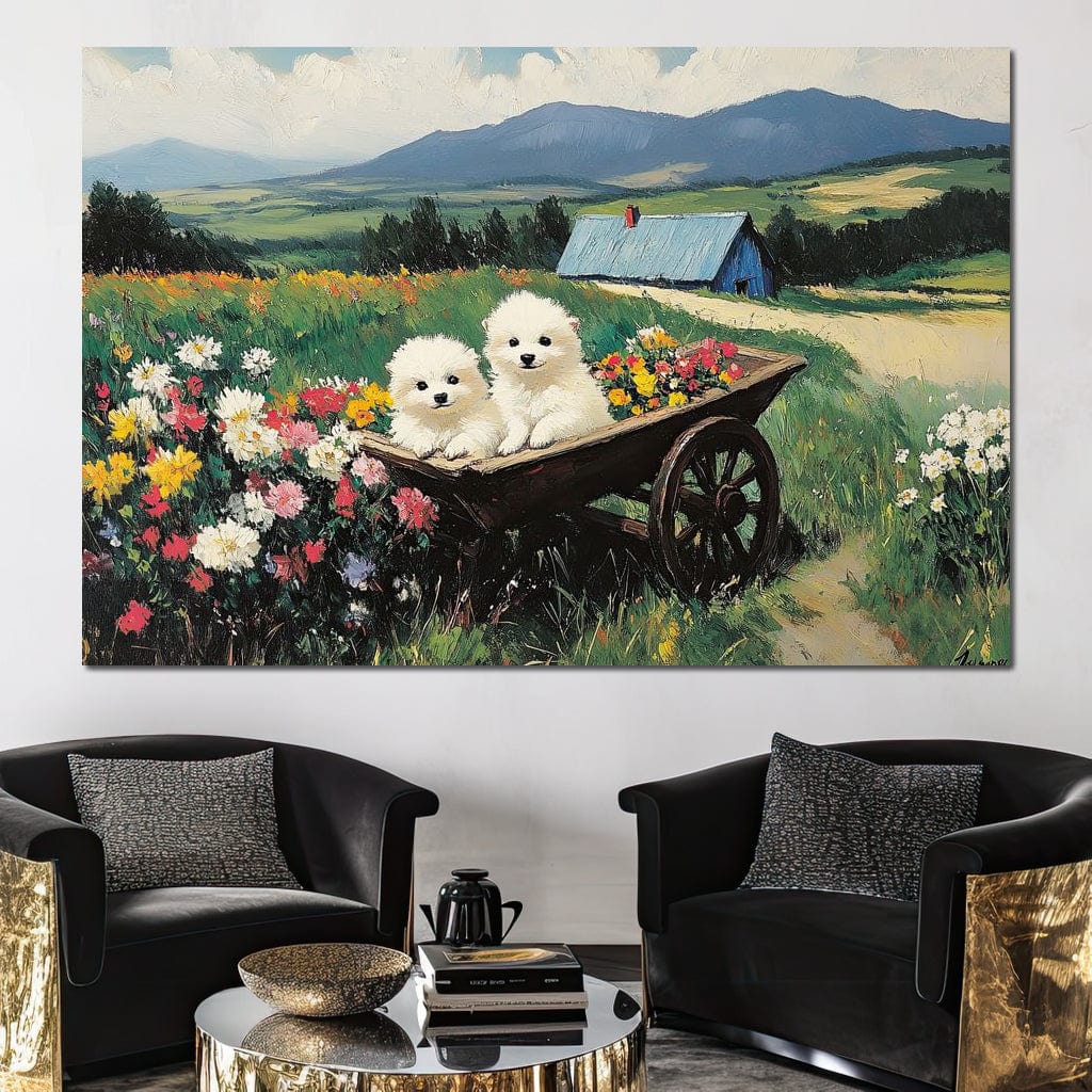 tablou canvas cu doi catelusi albi intr-o roaba plina cu flori, pe fundal idilic de campuri verzi si munti 