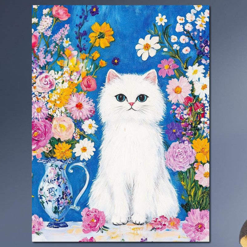 tablou canvas cu o pisica alba si o vaza cu flori multicolore, pe fundal albastru stil pictura in acuarela