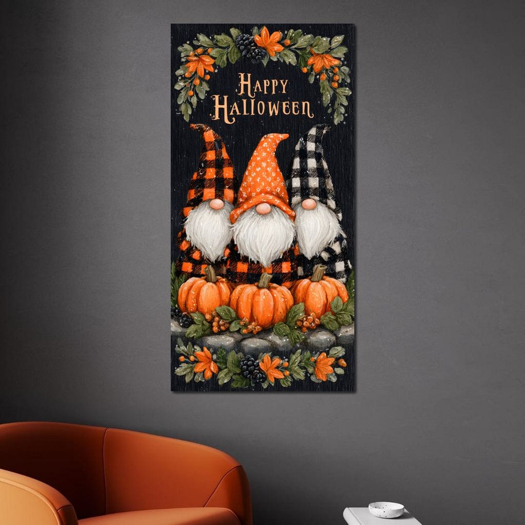 tablou canvas cu trei pitici cu trei dovleci in tema sarbatorii de Halloween, pe fundal intunecat