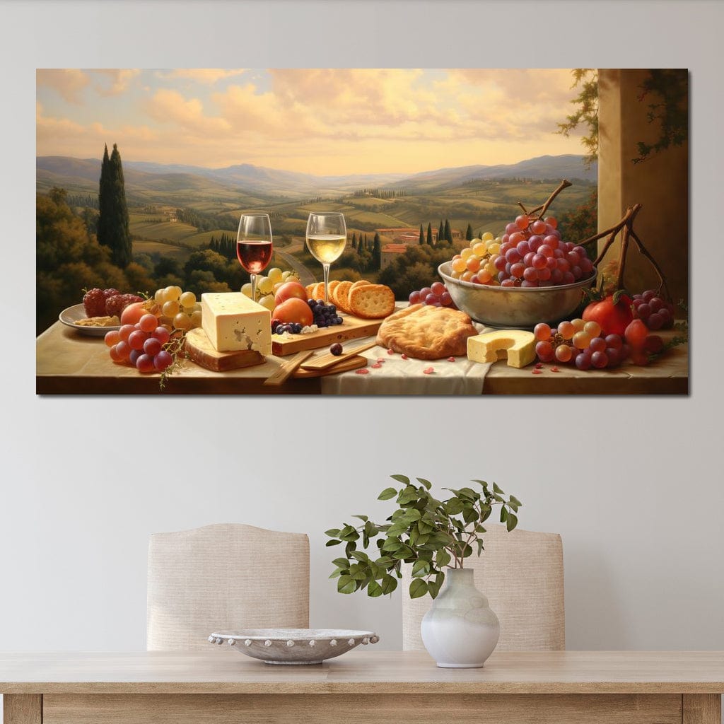 tablou canvas cu o masa traditionala, cu fructe si mancare, doua pahare de vin rosu si alb, cu o priveliste naturala cu dealuri si vegetatie