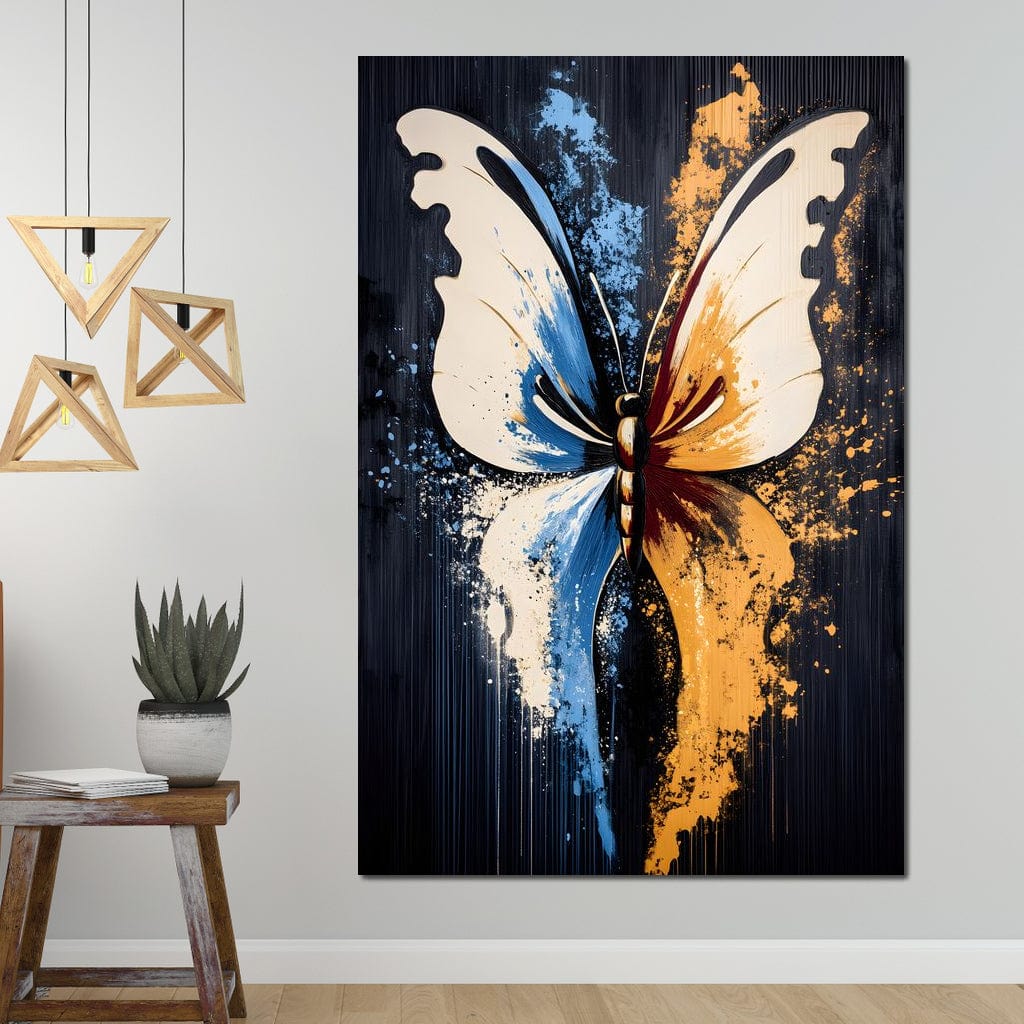 tablou canvas cu un fluture abstract in nuante vibrante de albastru si portocaliu, pe fundal negru texturat cu efecte de stropi