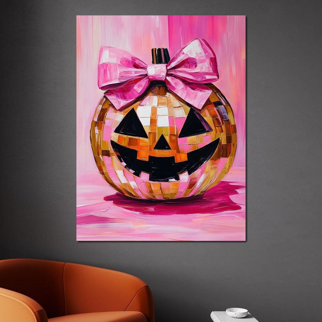 tablou canvas cu un dovleac decorat de Halloween cu fundita roz, pe fundal roz aprins
