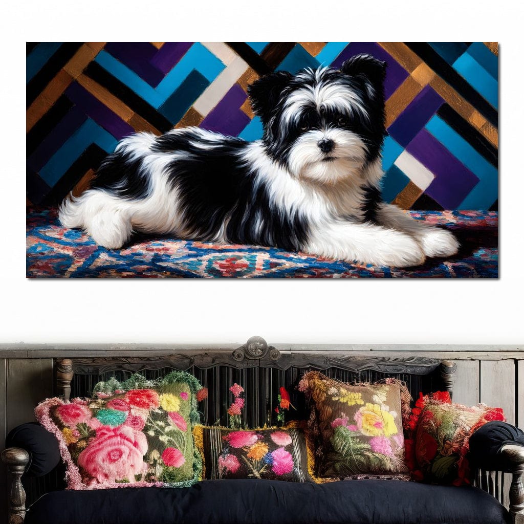 tablou canvas cu un catel blanos, alb si negru, asezat pe un covor colorat, pe fundal geometric in tonuri de albastru, violet