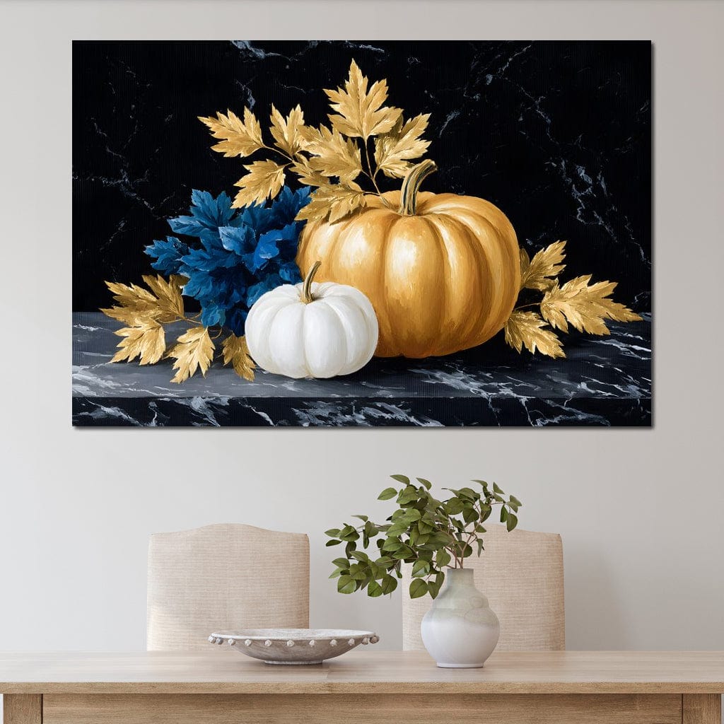 tablou canvas cu un dovleac alb si unul auriu, cu frunze albastre si aurii pe fundal negru tip marmura