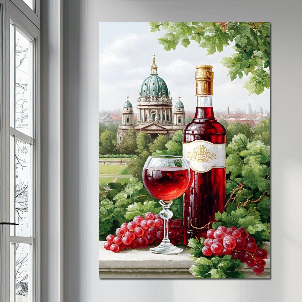 tablou canvas cu o sticla si un pahar de vin rosu, printre struguri si vegetatie, cu o manastire si un cadru urban pe fundal