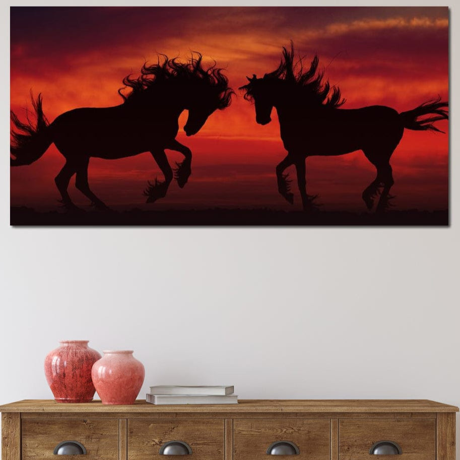 tablou canvas cu doi cai in umbra, pe fundal de apus rosiatic indian