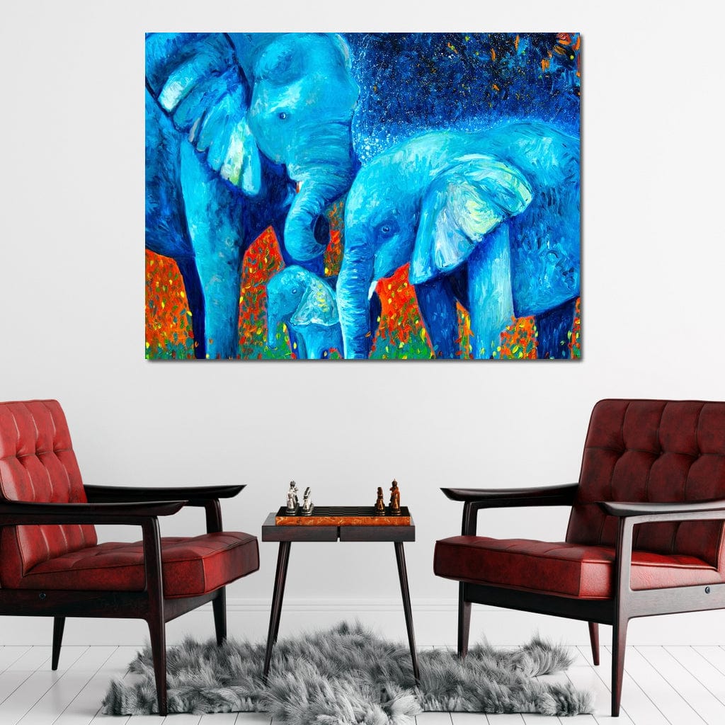 tablou canvas cu elefanti in nuante vibrante de albastru si fundal in tonuri aprinse de portocaliu si rosu