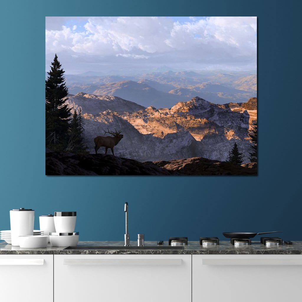 tablou canvas cu un elan intr-un peisaj montan, inconjurat de copaci si stanci sub cer senin