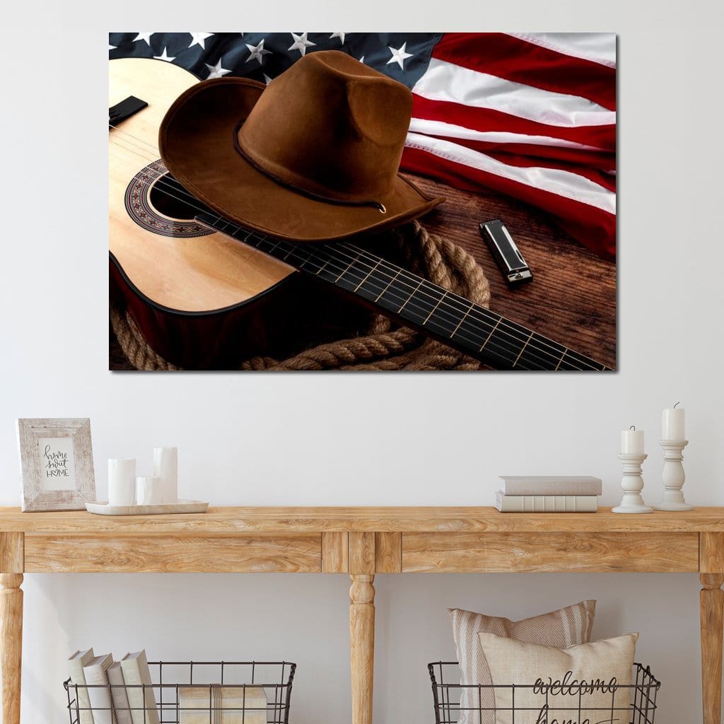 tablou canvas cu o palarie de cowboy, o chitara, o muzicuta si steagul Americii