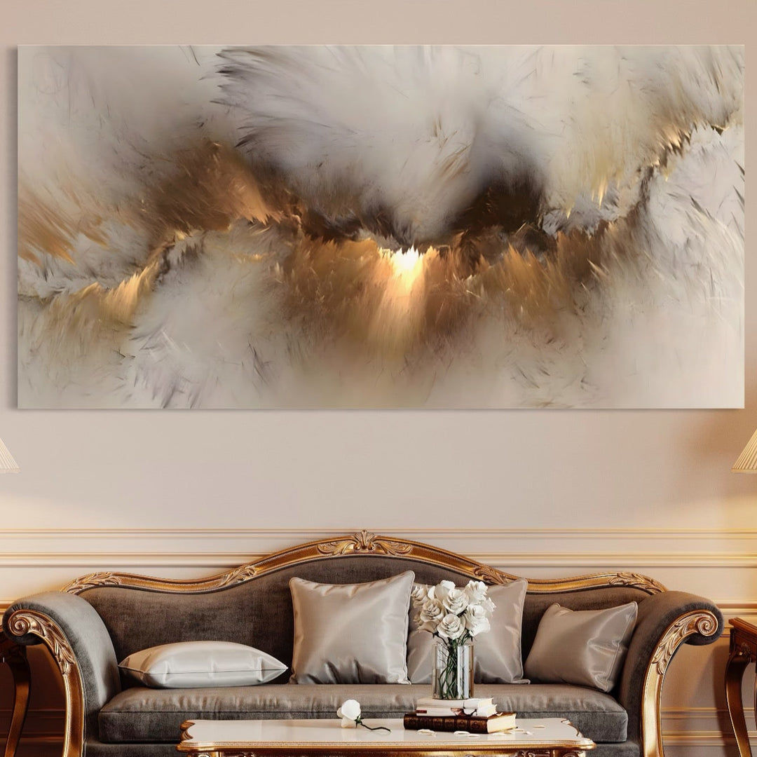 Un living luxos are o canapea cu ciucuri, perne decorative și o măsuță de cafea cu flori sub LuxCanva® Tablou Canvas Premium B1082 "Divina Lumina", o lucrare abstractă în tonuri vibrante de alb, auriu și maro.