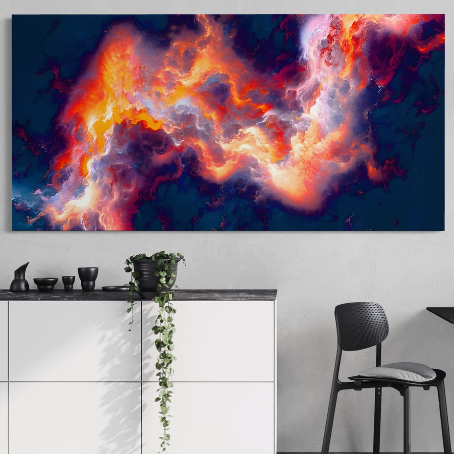 Tabloul Canvas Premium LuxCanva® A1212, abstract și multicolor, cu nori portocalii, galbeni și roz pe fund albastru închis, aduce eleganță dormitorului modern și se potrivește perfect cu mobilier alb și scaun negru.