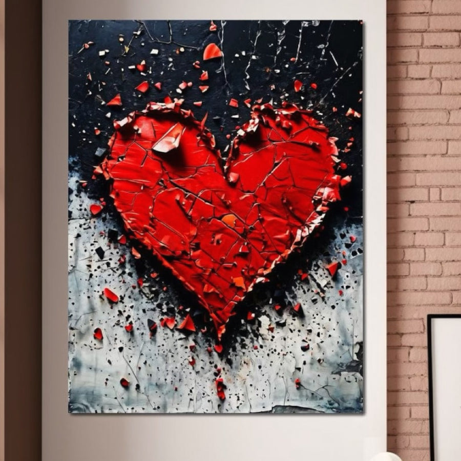 Tabloul LuxCanva® Tablou Canvas Premium E1007, Dragoste in Ruine, prezintă o inimă roșie fragmentată pe un fundal alb-negru, simbolizând pasiunea și fragilitatea - arta murală vibrantă perfectă pentru camera dvs. de zi.