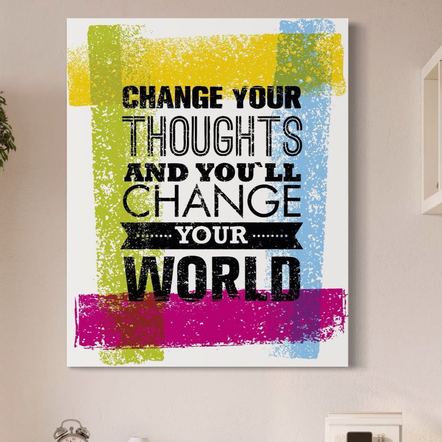 LuxCanva® Tablou Canvas Premium A1367 prezintă tușe vibrante de galben, verde, albastru și magenta pe panza bumbac cu "Schimbă-ți gândurile și îți vei schimba lumea" în text negru.