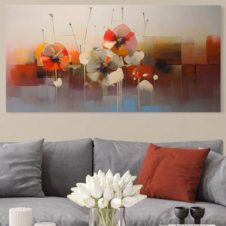 Un living modern cu o canapea gri, perne vibrante portocalii și gri, o vază cu lalele albe pe masă și Tablou Canvas Premium A1376 de la LuxCanva® cu flori pictate în roșu, alb și portocaliu care împodobesc peretele.