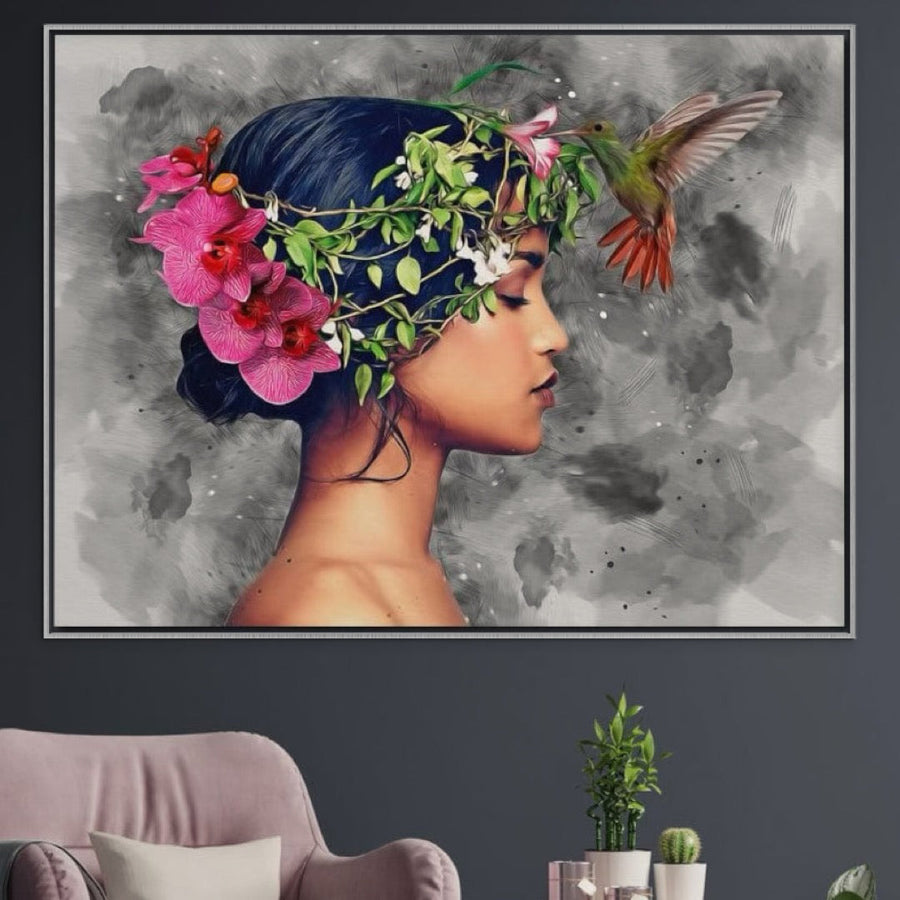 LuxCanva® Tablou Canvas Premium G1107 afișează profilul unei femei cu flori în păr și o pasăre colibri în apropiere, îmbinând feminitatea și natura pentru un decor poetic, premium, ideal pentru sufragerii sau dormitoare.