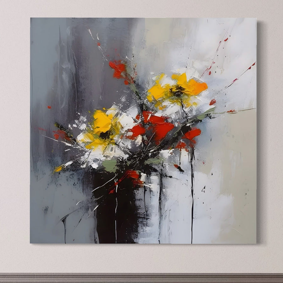 Tabloul LuxCanva® Tablou Canvas Premium LuxCanva® A1459, "Armonia Florilor", prezintă flori abstracte vibrante galbene și roșii cu stropi de alb și negru pe un fundal gri și alb-deschis pentru un decor elegant al camerei de zi.