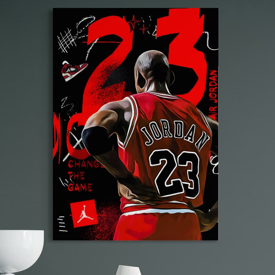 Tablou Canvas Premium LuxCanva® A1490 prezintă un baschetbalist în tricou roșu Jordan23, cu grafică vibrantă "Change the Game" și "Air Jordan", perfect pentru fanii NBA. Imprimat pe pânză de calitate premium, ideal pentru camera ta.
