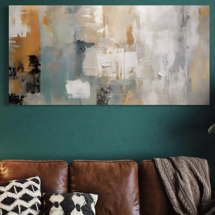 Tablou Canvas Premium LuxCanva® A1588, abstract, decorativ cu nuanțe de alb pentru living, expus pe un perete verde deasupra unei canapele maro din piele, accesorizat cu pernă decorativă și pled texturat.