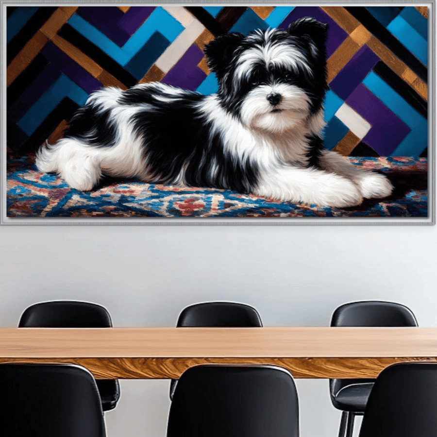 O sală de ședințe cu masă de lemn și scaune negre sunt pe perete un tablou LuxCanva® Premium M1293 cu imprimeu abstract geometric, ce ilustrează un cățel blănos alb-negru pe covor colorat, perfect pentru birou sau living.