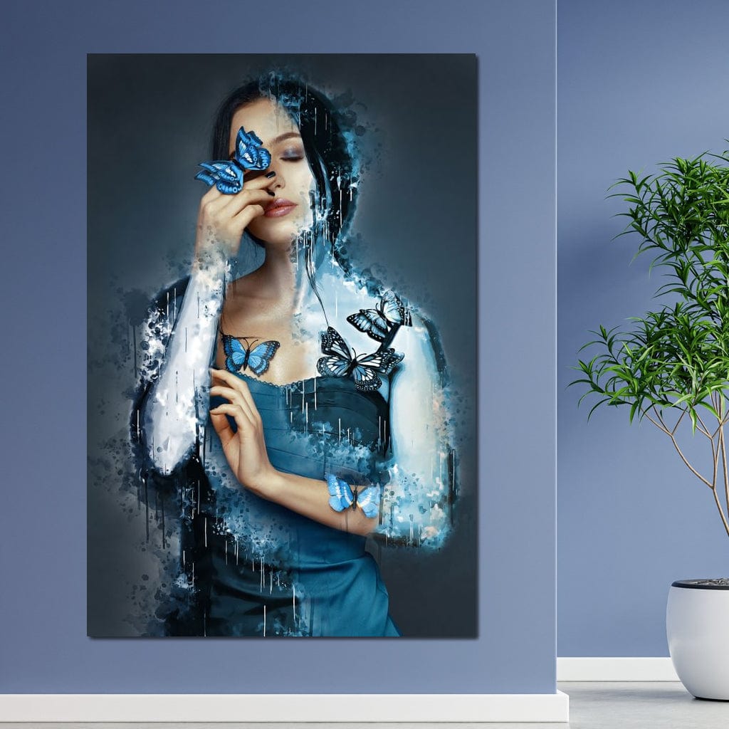 tablou canvas cu o femeie inconjurata de fluturi albastri, intr-o compozitie artistica in nuante reci